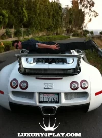 planking-on-bugatti.webp