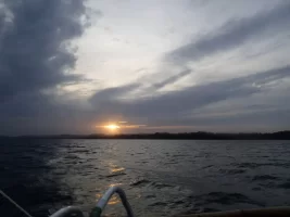 SiargaoFootprintsBoatTripSunset.webp